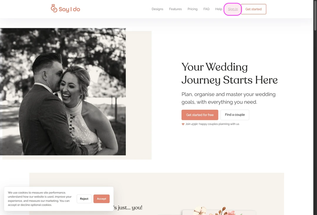 SayIDo homepage with the Sign In link in the top navigation and a black and white photo of a laughing couple