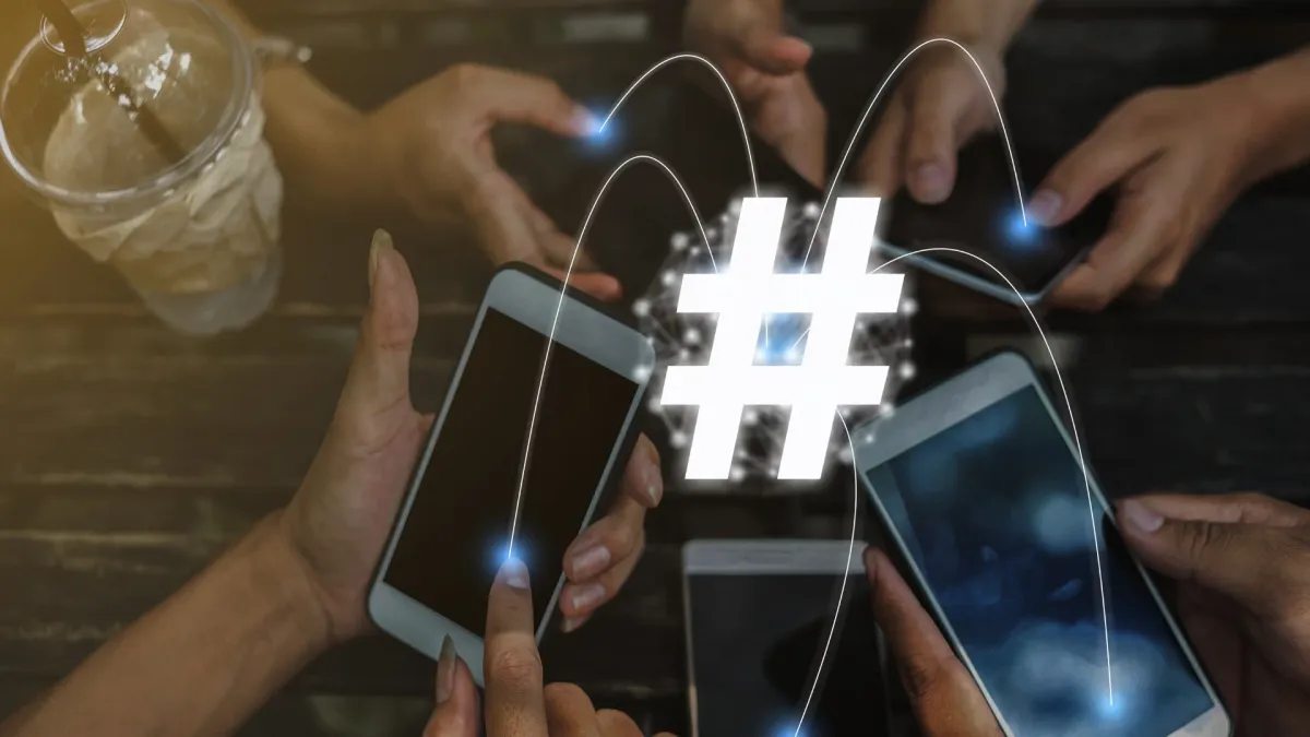 Wedding hashtag symbol on a screen, symbolizing social media's role in collecting wedding photos from guests