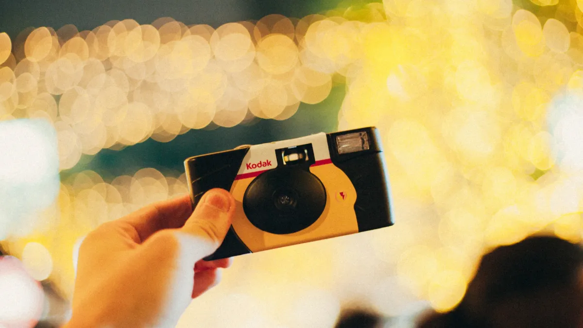 Disposable camera on a wedding table, perfect for cost-effective wedding photography