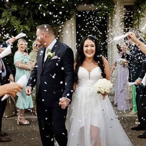 Bride and groom celebrated with confetti
