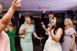Bride dancing with guests