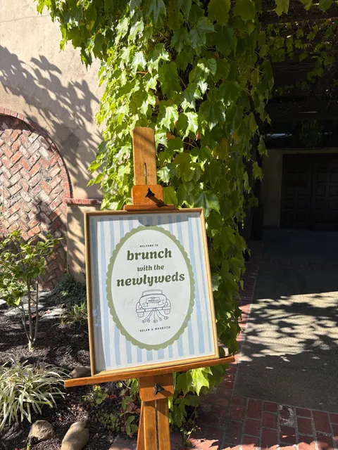 Brunch with the newlyweds welcome sign outside the venue